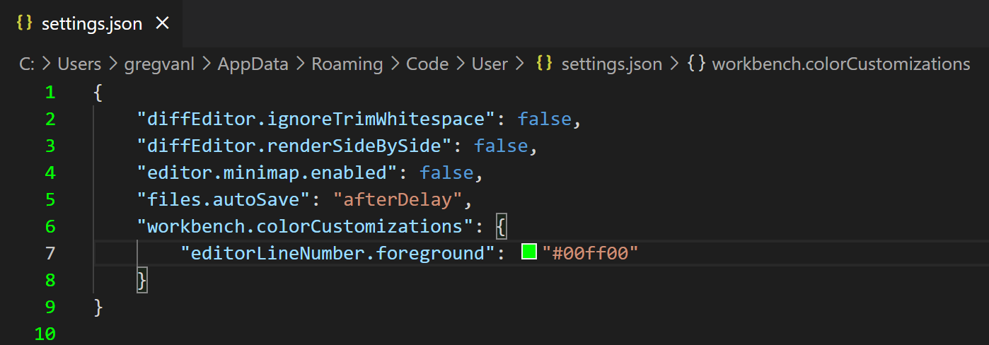带有绿色行号的 settings.json 编辑器